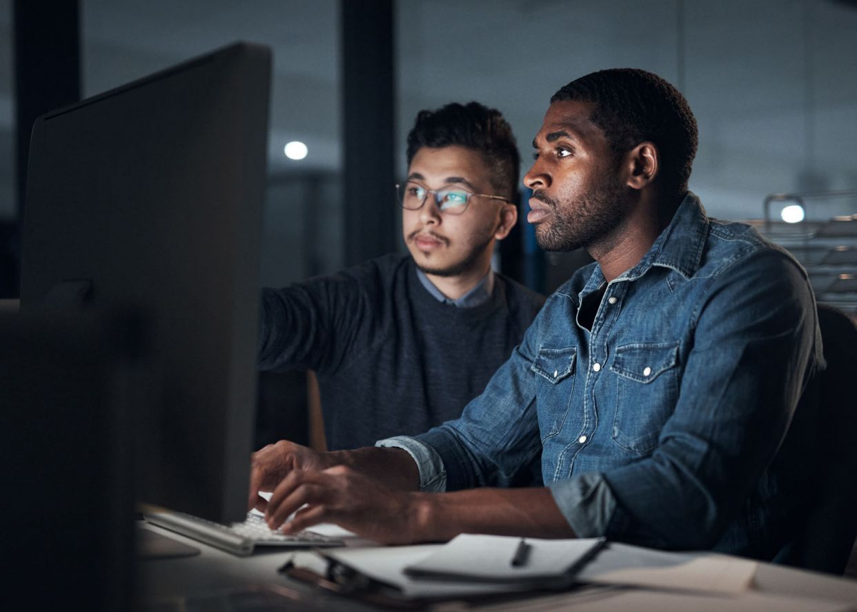 two people discussing RPA automation strategy