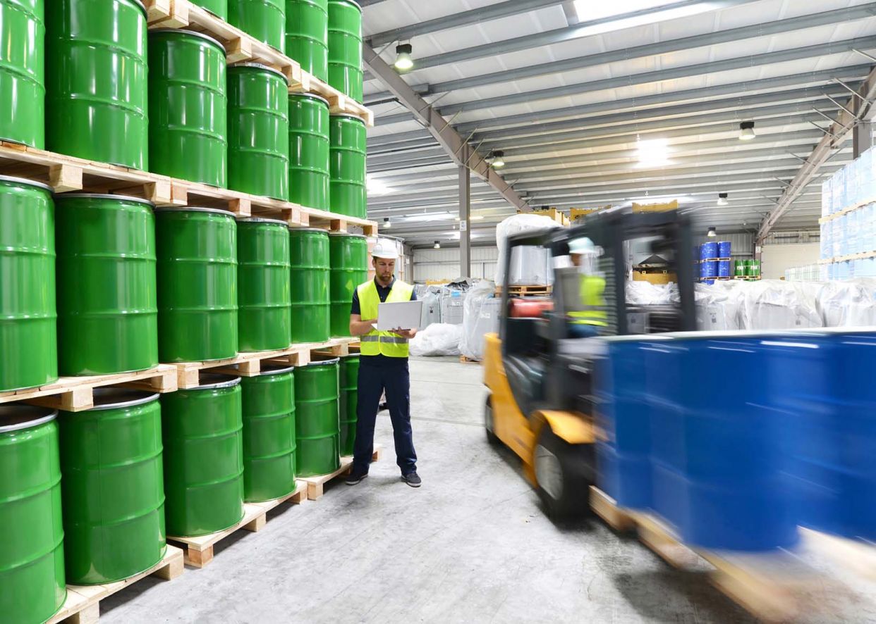 chemical-plant-workers-fast-forklift