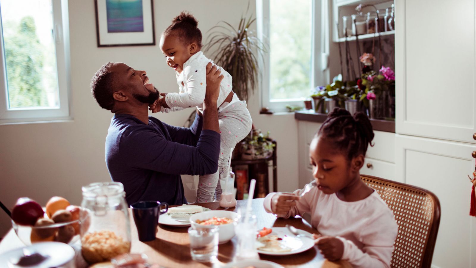 young family having breakfast