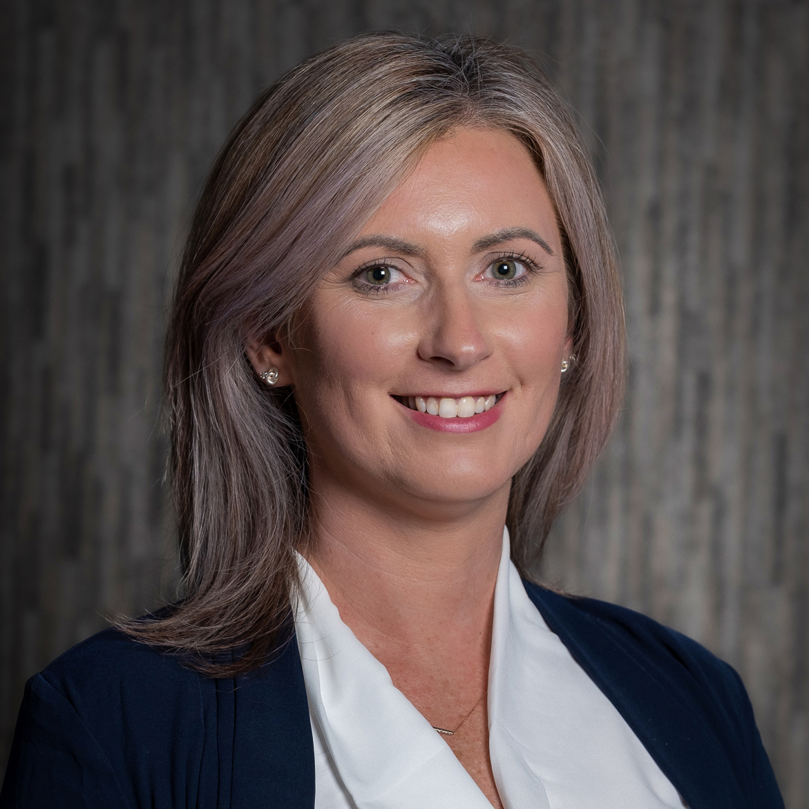 professional photo of Kim Albrecht smiling