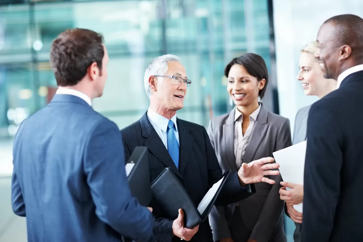 business man conversing with team