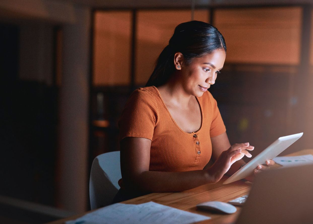young business woman working on tablet