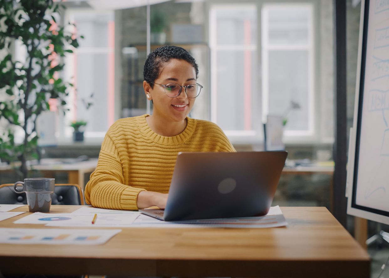 young professional working on laptop