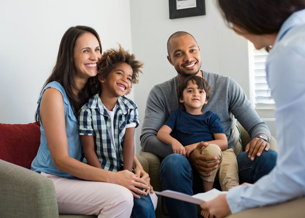 family with advisor at home