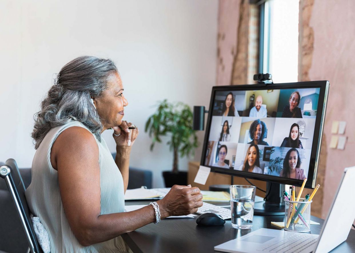diverse woman virtual team meeting working at home