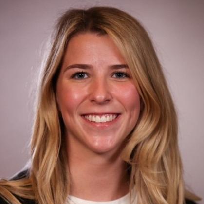 professional photo of Kelsey McGowan smiling at the camera