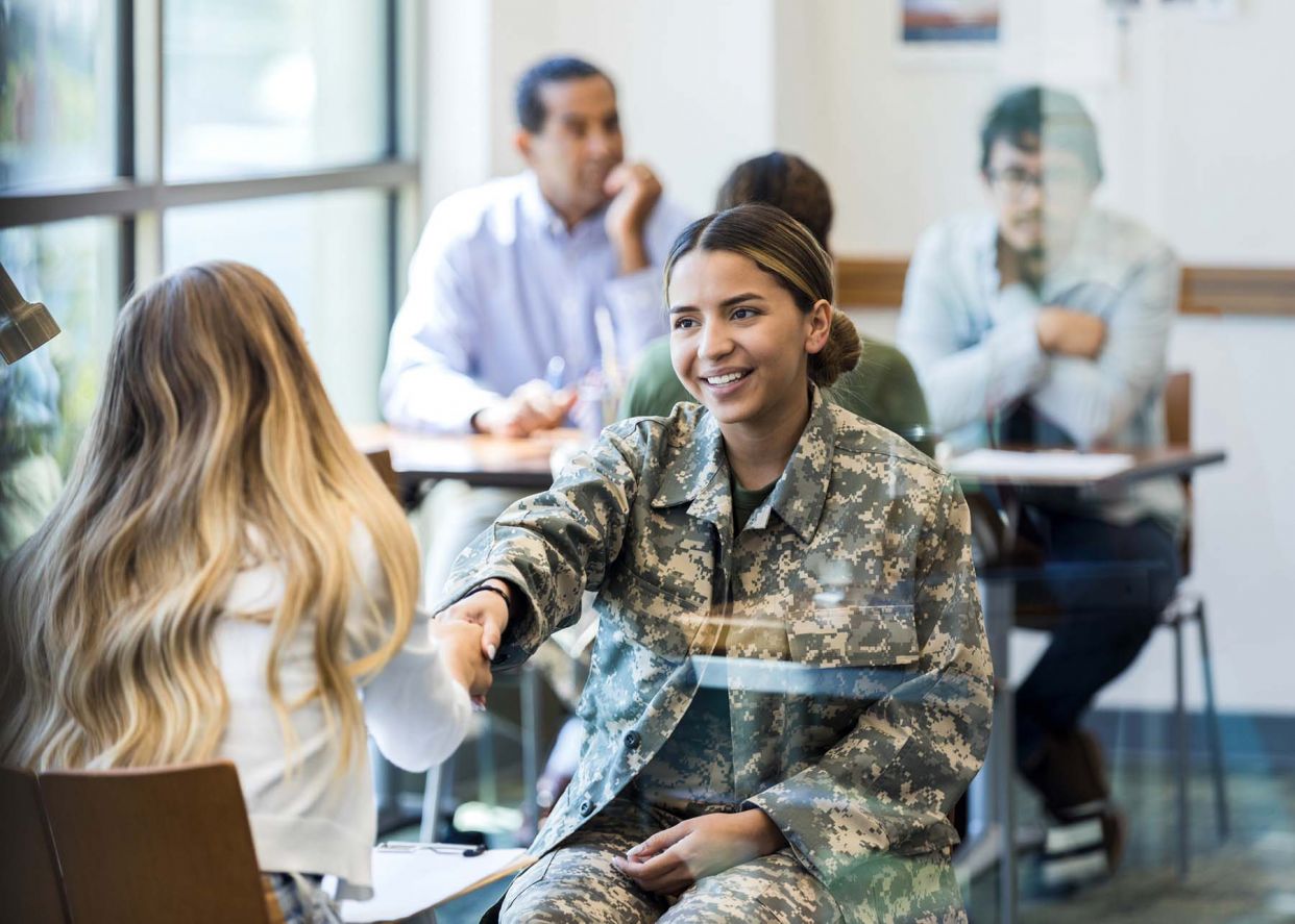 young woman soldier consults with counselor