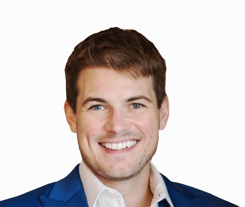 professional photo of Spencer Skinner smiling at the camera