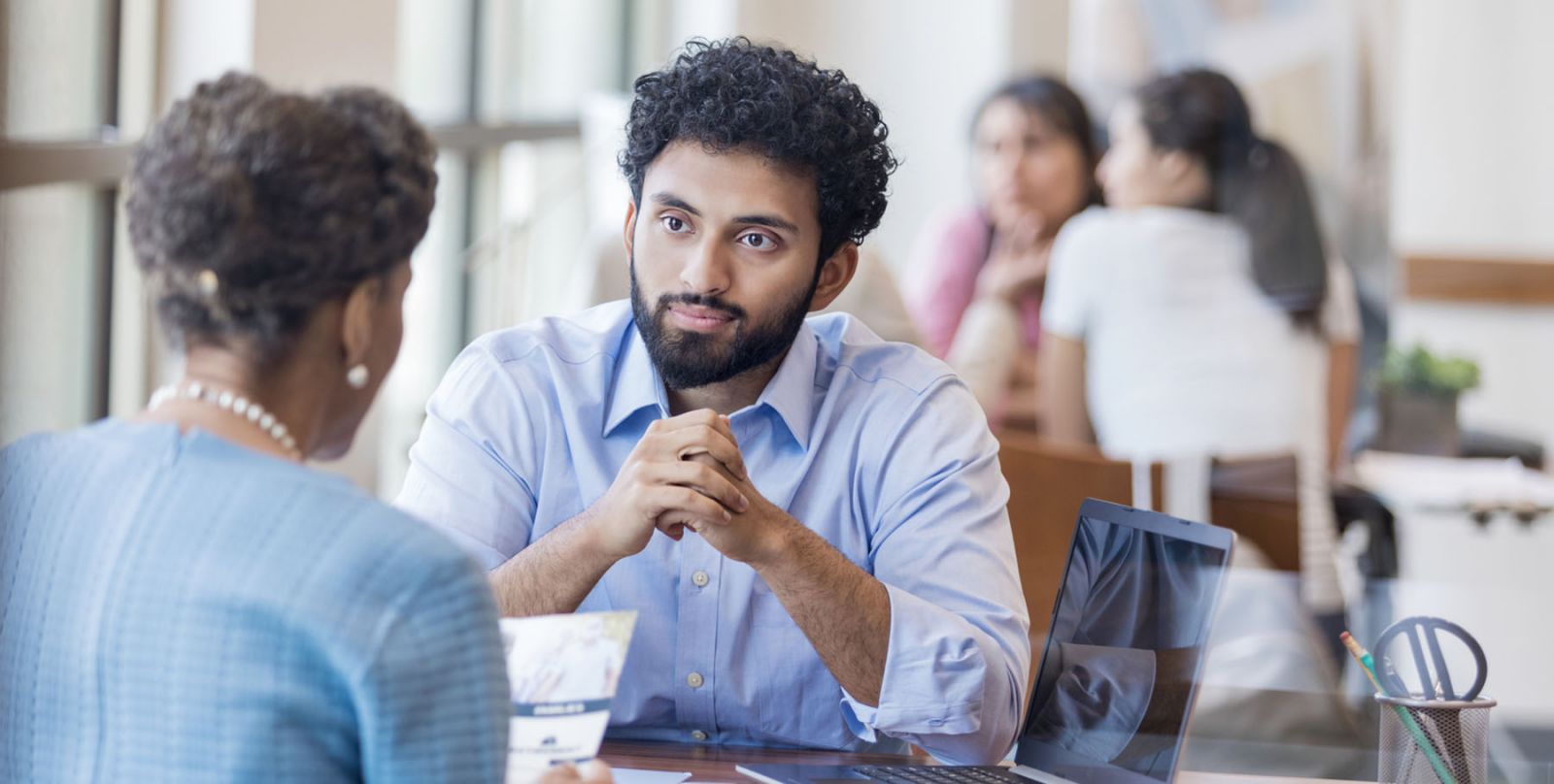 meeting discussion between two diverse associates