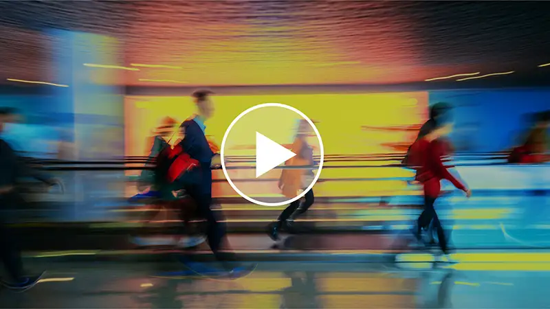 Video preview with play icon for CAI About Us